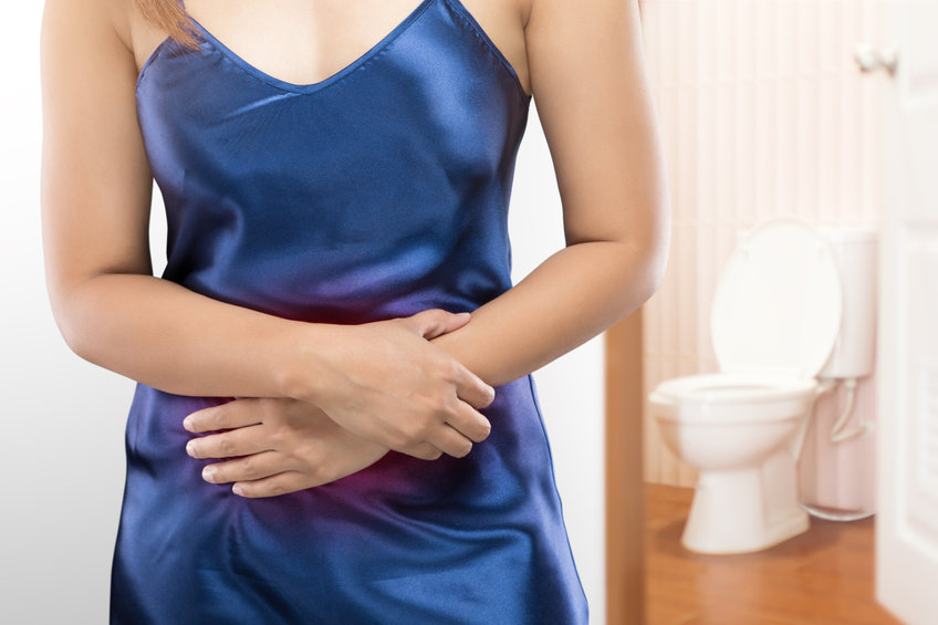 dr-angela-woman-clutching-belly-ovarian-cancer-symptoms